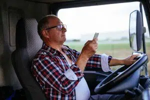 photo of truck driver on phone
