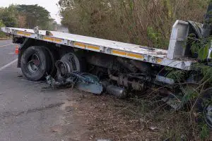 photo of a semi truck stuck in ditch