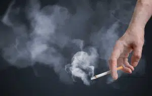 photo of a cigarette and some smoke
