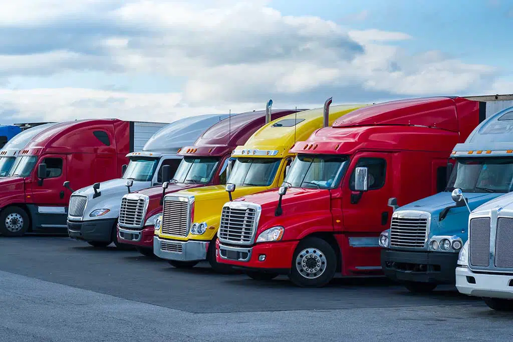photo of a line of semi trucks