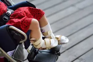 Girl with cerebral palsy in wheelchair