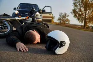 Photo of Motorcyclist hit by car