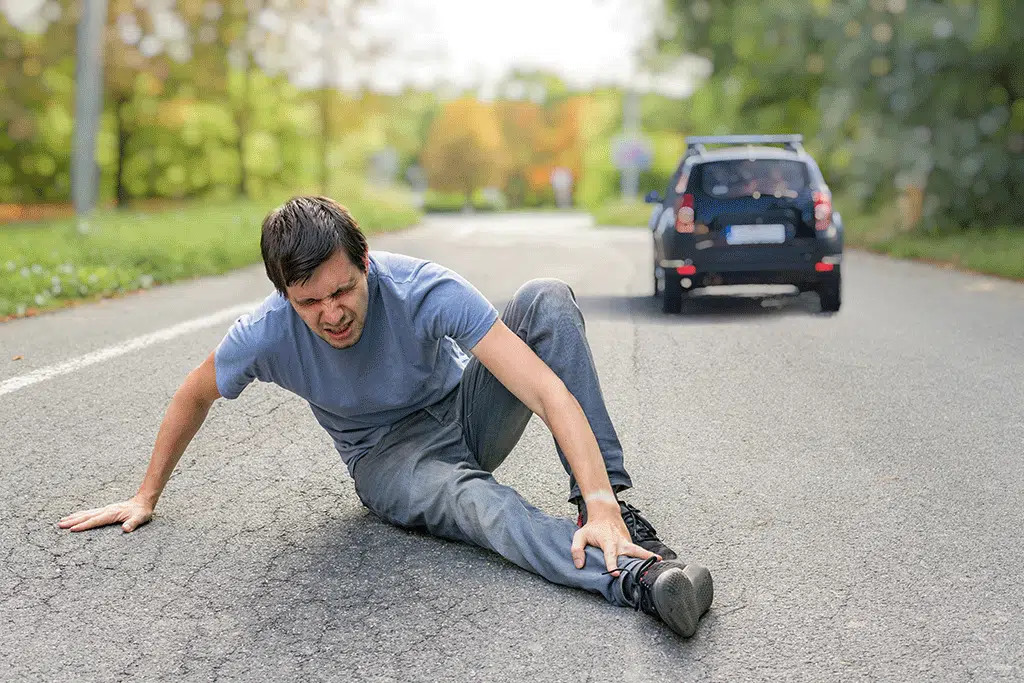 photo of a man in pain after experiencing a hit and run