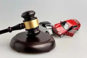 photo of a gavel and car accident
